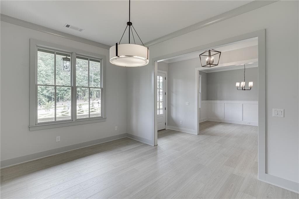5 bedroom, 4 bathroom, 4,159 sq ft single family residence for sale at 5370 Settingdown Road, Cumming, GA 30041 — photo 6