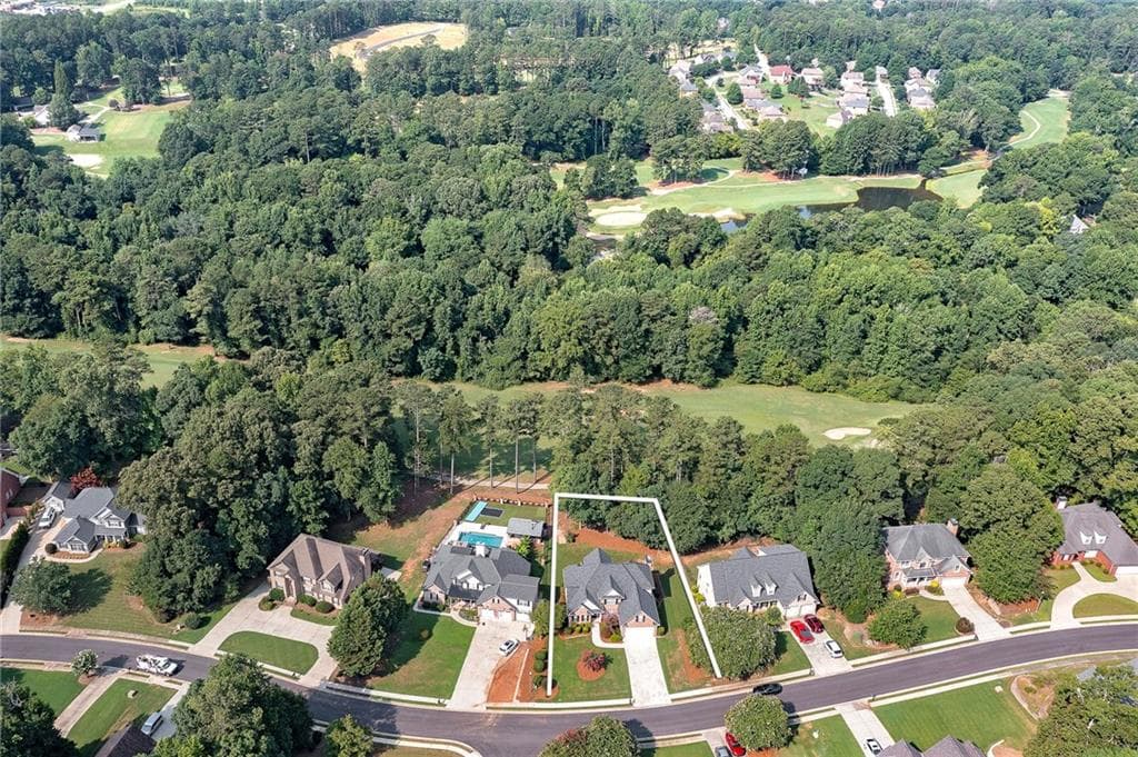 6 bedroom, 5 bathroom, 4,688 sq ft single family residence for sale at 10146 Azalea Drive, Covington, GA 30014 — photo 2