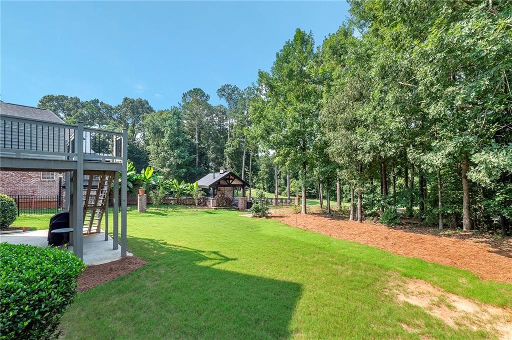 6 bedroom, 5 bathroom, 4,688 sq ft single family residence for sale at 10146 Azalea Drive, Covington, GA 30014 — photo 4