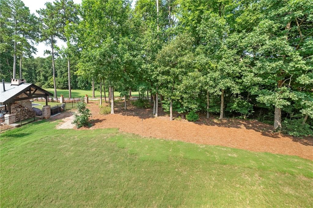 6 bedroom, 5 bathroom, 4,688 sq ft single family residence for sale at 10146 Azalea Drive, Covington, GA 30014 — photo 9