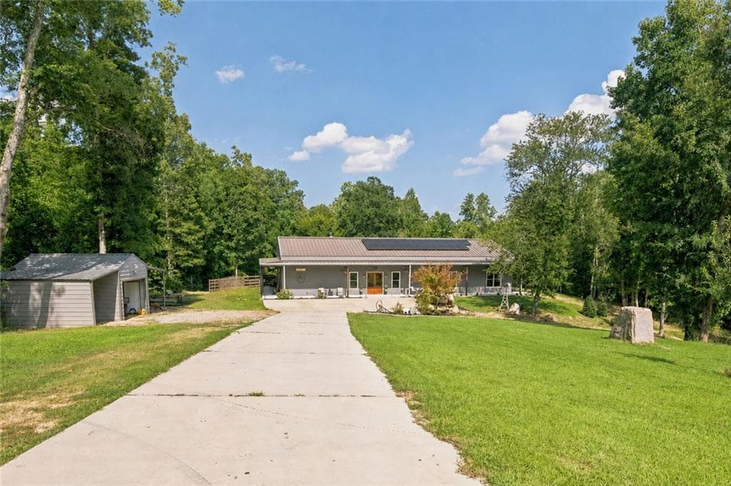 4 bedroom, 3 bathroom, 3,600 sq ft single family residence for sale at 1411 Williams Road, Dallas, GA 30132 — photo 2