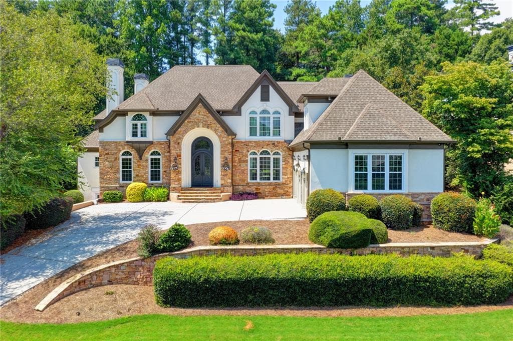 6 bedroom, 5 bathroom, 8,355 sq ft single family residence for sale at 3154 Saint Ives Country Club Parkway, Johns Creek, GA 30097