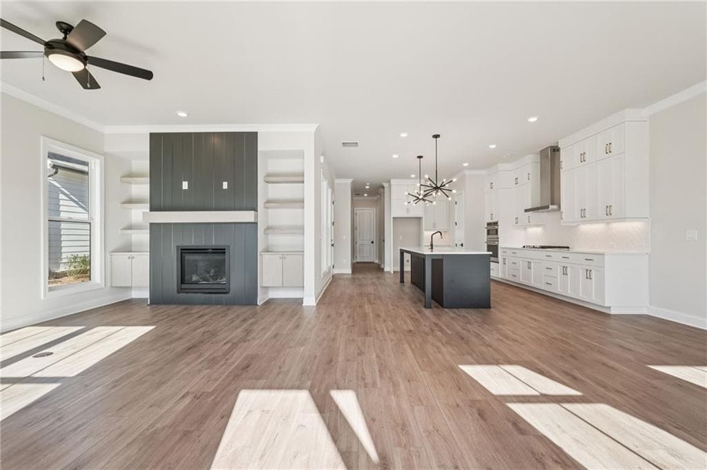 4 bedroom, 4 bathroom, 2,620 sq ft single family residence for sale at 565 Sawnee Village Boulevard, Cumming, GA 30040 — photo 7