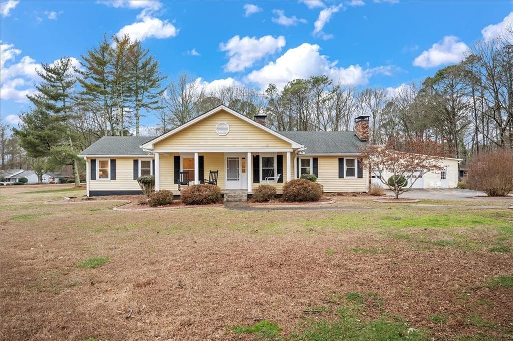3 bedroom, 3 bathroom, 1,948 sq ft single family residence for rent at 14605 Cogburn Road, Alpharetta, GA 30004 for $3,500 a month — photo 1 of 50