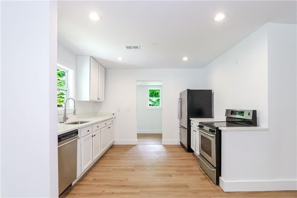 3 bedroom, 2 bathroom, 1,172 sq ft single family residence for sale at 2130 Donald Lee Hollowell Parkway, Atlanta, GA 30318 — photo 3