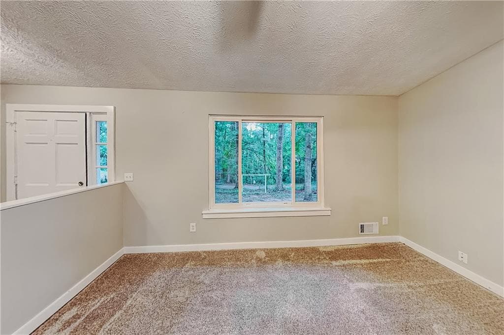 3 bedroom, 2 bathroom, 2,035 sq ft single family residence for rent at 4579 N Woodlake Lane, Conyers, GA 30013 for $1,675 a month — photo 2
