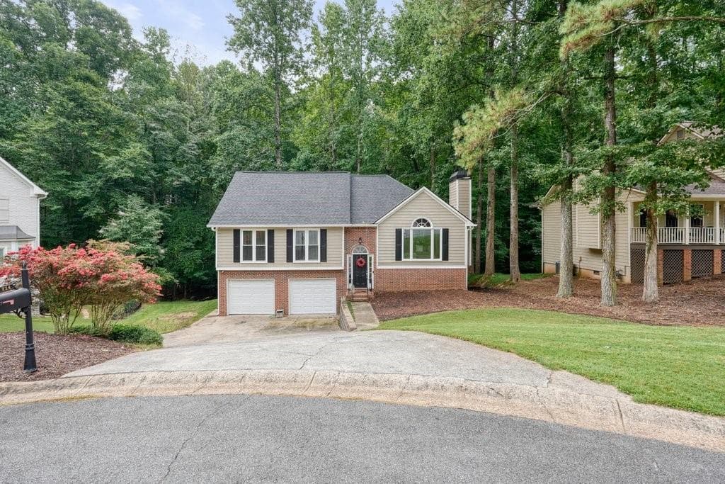 4 bedroom, 3 bathroom, 2,696 sq ft single family residence for sale at 714 Players Court, Woodstock, GA 30189