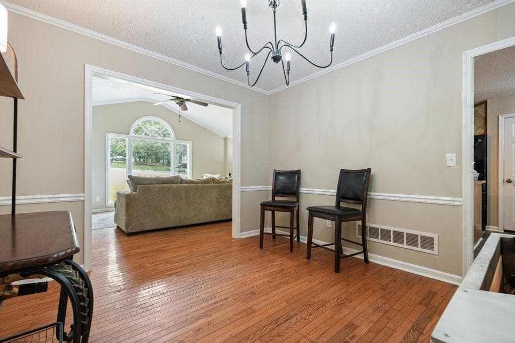 4 bedroom, 3 bathroom, 2,696 sq ft single family residence for sale at 714 Players Court, Woodstock, GA 30189 — photo 4