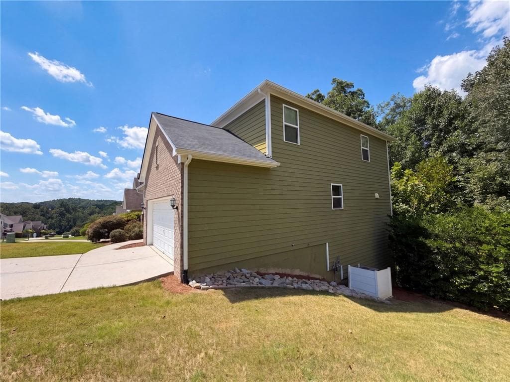 4 bedroom, 3 bathroom, 3,446 sq ft single family residence for sale at 764 Binkley Walk, Buford, GA 30518 — photo 5