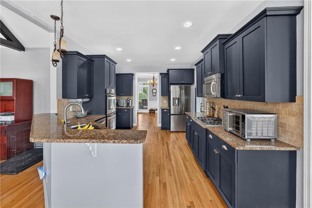 6 bedroom, 4 bathroom, 4,519 sq ft single family residence for sale at 105 Blackberry Run Dr, Dallas, GA 30132 — photo 4