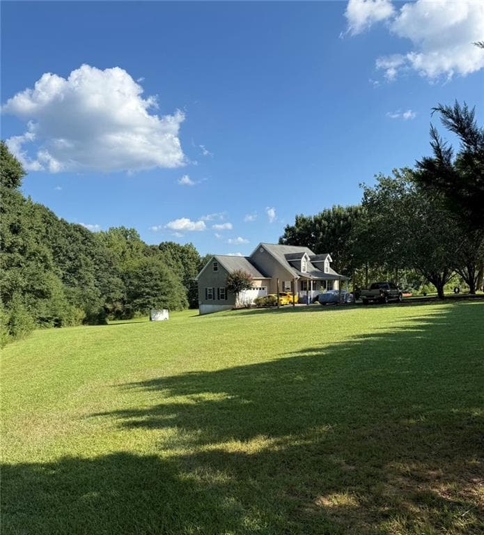 3 bedroom, 3 bathroom, 2,398 sq ft single family residence for sale at 1986 Hewell Road, Dewy Rose, GA 30634 — photo 4