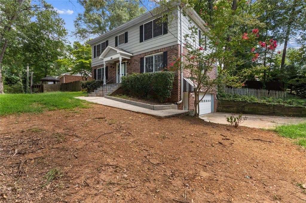 4 bedroom, 3 bathroom, 3,395 sq ft single family residence for sale at 3722 Southgate Drive, Lilburn, GA 30047 — photo 2