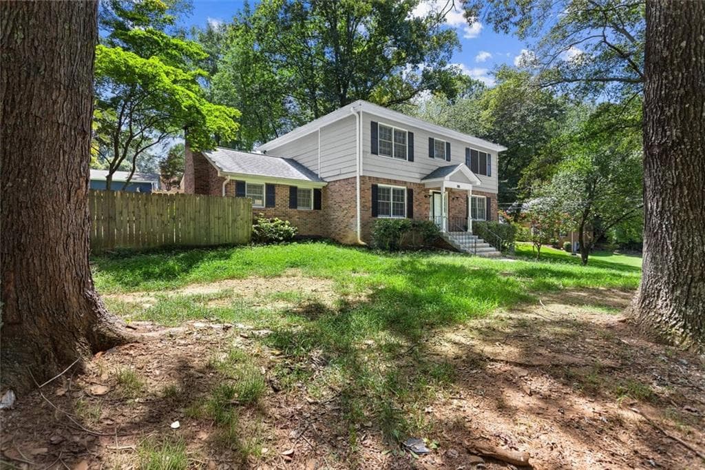 4 bedroom, 3 bathroom, 3,395 sq ft single family residence for sale at 3722 Southgate Drive, Lilburn, GA 30047 — photo 3