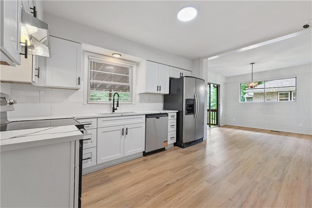 4 bedroom, 3 bathroom, 1,250 sq ft single family residence for sale at 2529 Riggs Drive, Atlanta, GA 30344 — photo 6
