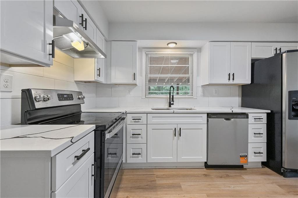 4 bedroom, 3 bathroom, 1,250 sq ft single family residence for sale at 2529 Riggs Drive, Atlanta, GA 30344 — photo 8