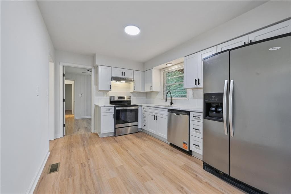 4 bedroom, 3 bathroom, 1,250 sq ft single family residence for sale at 2529 Riggs Drive, Atlanta, GA 30344 — photo 9