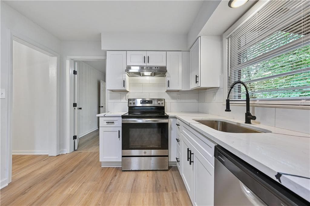 4 bedroom, 3 bathroom, 1,250 sq ft single family residence for sale at 2529 Riggs Drive, Atlanta, GA 30344 — photo 10