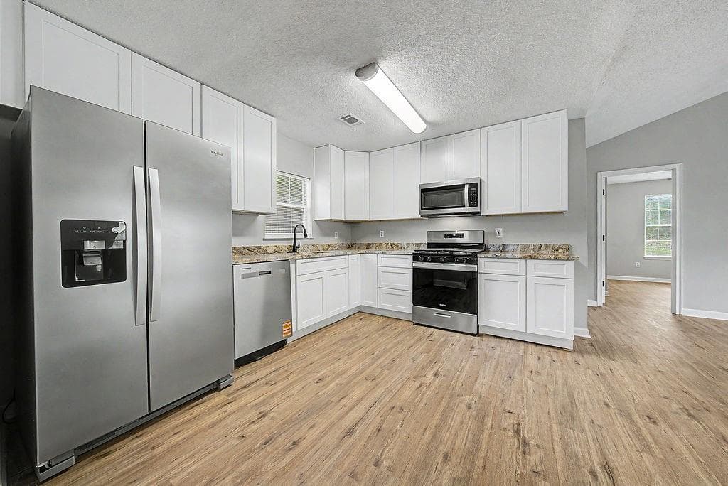 4 bedroom, 2 bathroom, 1,148 sq ft single family residence for sale at 1488 Cain Court, Douglasville, GA 30134 — photo 6