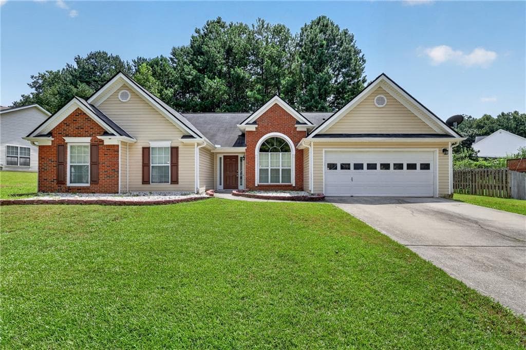 3 bedroom, 2 bathroom, 2,055 sq ft home for sale at 1142 Autumn Glen Way, Dacula, GA