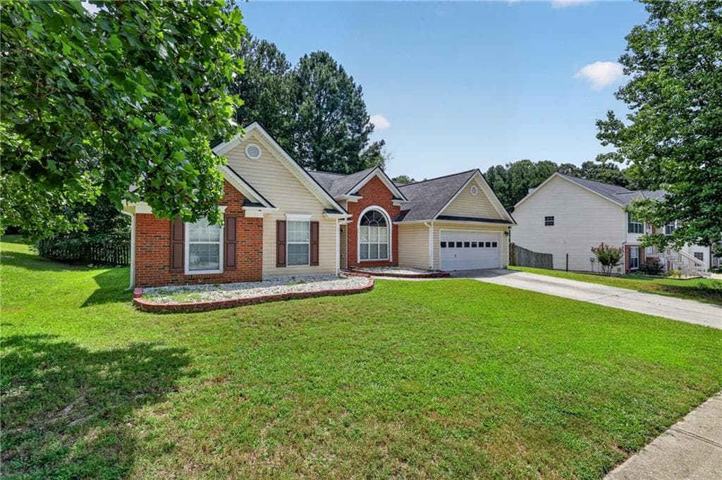 3 bedroom, 2 bathroom, 2,055 sq ft single family residence for sale at 1142 Autumn Glen Way, Dacula, GA 30019 — photo 4