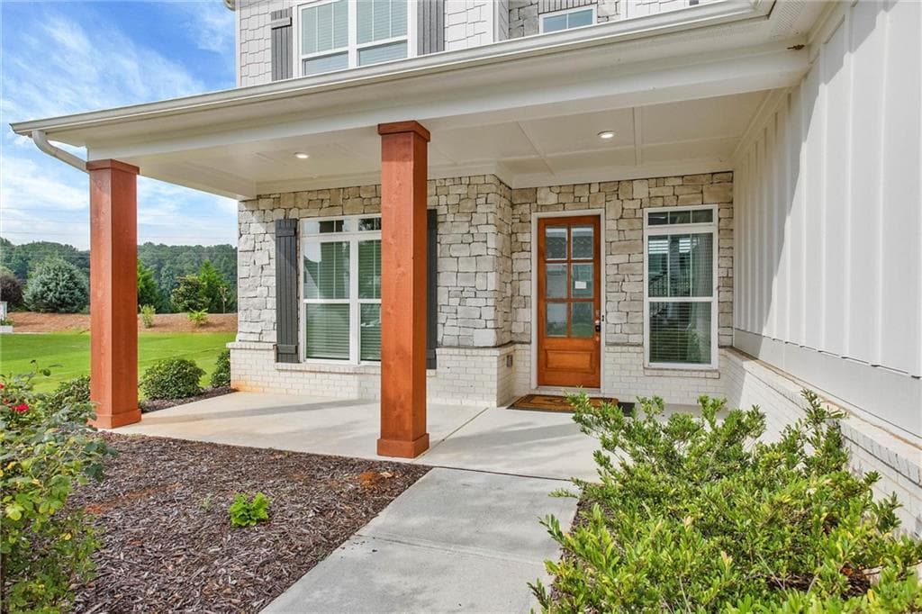 5 bedroom, 4 bathroom, 3,566 sq ft single family residence for sale at 3330 Carswell Bend, Cumming, GA 30028 — photo 3