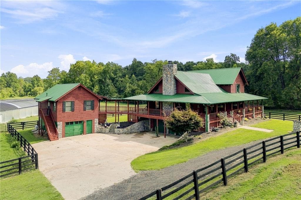 4 bedroom, 3 bathroom, 2,950 sq ft single family residence for sale at 1225 Henry Turner Trail, Ball Ground, GA 30107 — photo 2