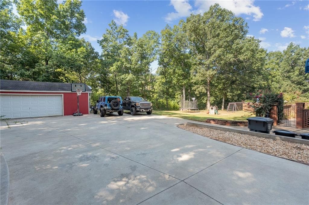 5 bedroom, 3 bathroom, 4,302 sq ft single family residence for sale at 205 High Point Forest Drive, Covington, GA 30016 — photo 8