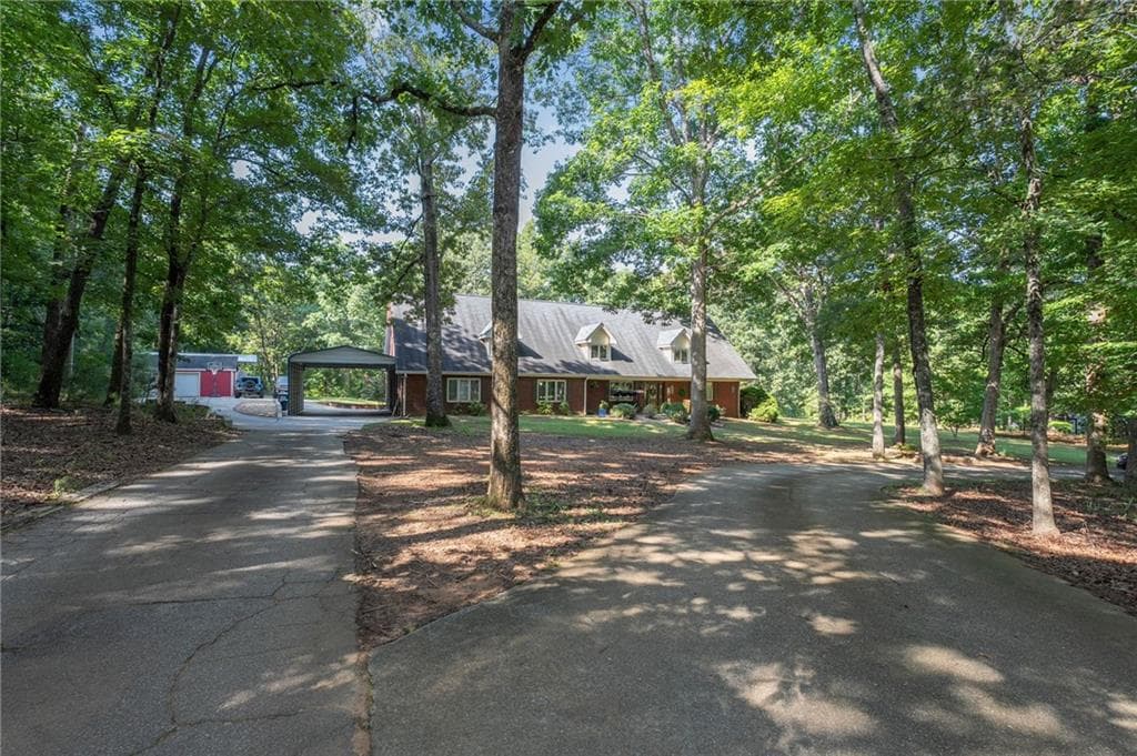 5 bedroom, 3 bathroom, 4,302 sq ft single family residence for sale at 205 High Point Forest Drive, Covington, GA 30016