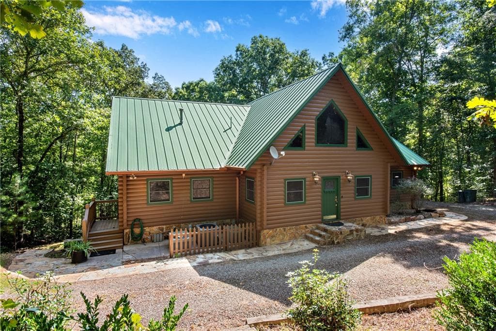 5 bedroom, 6 bathroom, 5,302 sq ft single family residence for sale at 1300 Soap Creek Road, Ball Ground, GA 30107 — photo 1 of 69