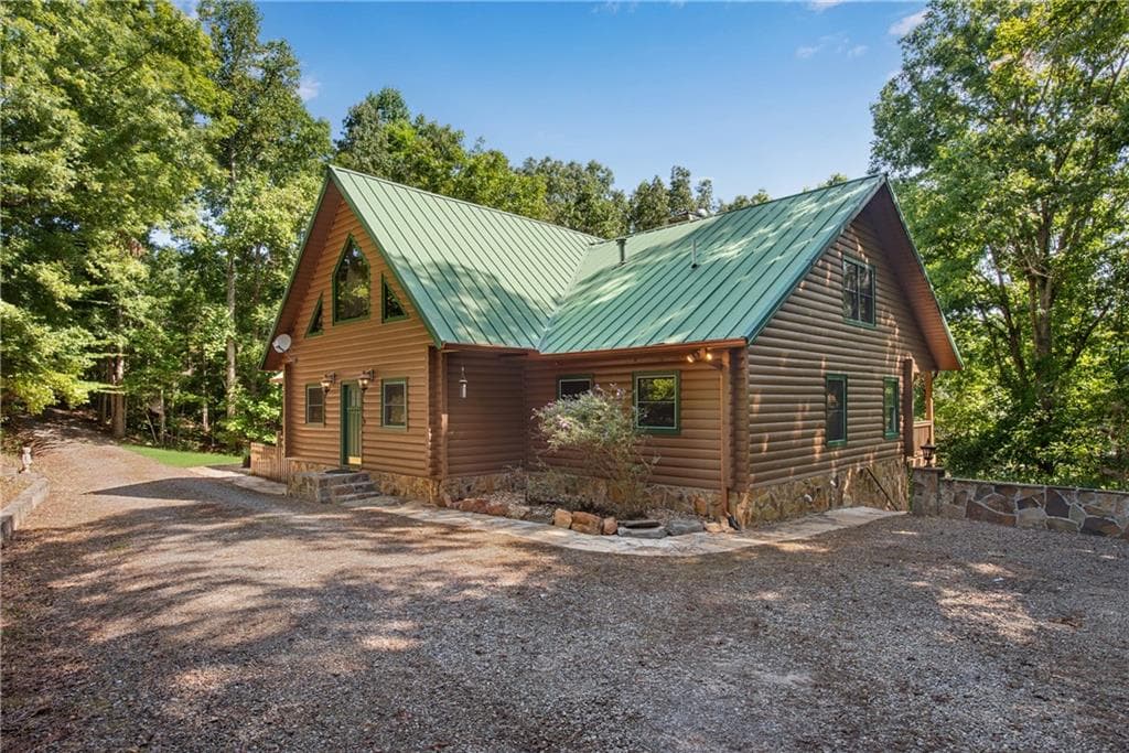 5 bedroom, 6 bathroom, 5,302 sq ft single family residence for sale at 1300 Soap Creek Road, Ball Ground, GA 30107 — photo 8