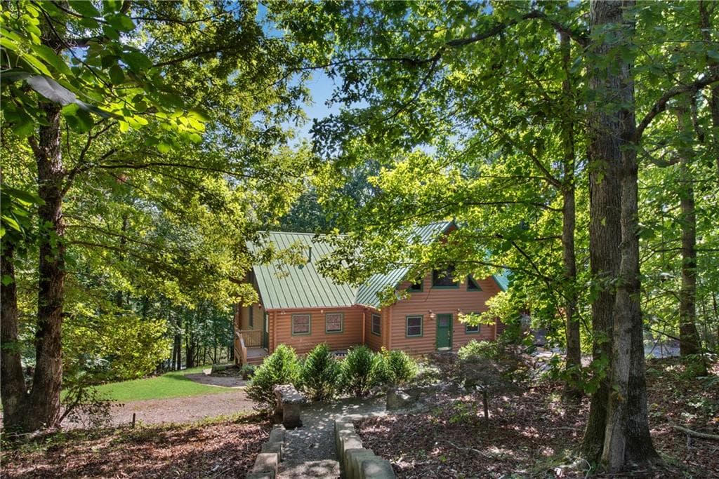 5 bedroom, 6 bathroom, 5,302 sq ft single family residence for sale at 1300 Soap Creek Road, Ball Ground, GA 30107 — photo 9