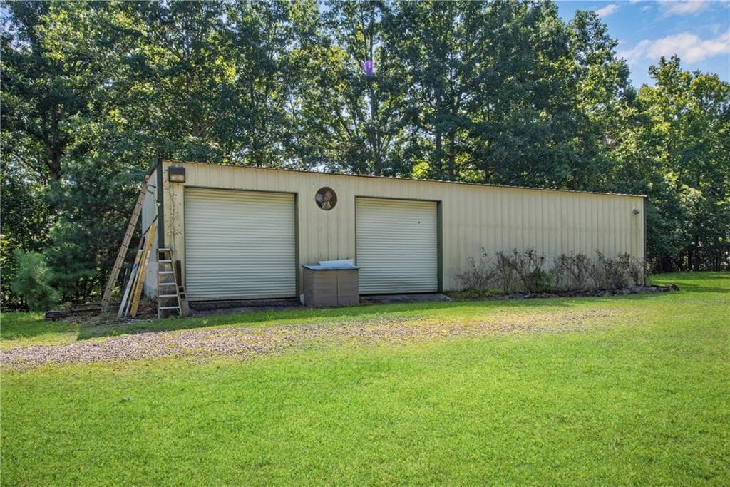 5 bedroom, 6 bathroom, 5,302 sq ft single family residence for sale at 1300 Soap Creek Road, Ball Ground, GA 30107 — photo 7