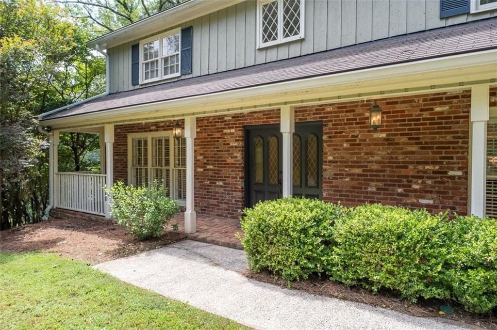 4 bedroom, 3 bathroom, 2,707 sq ft single family residence for sale at 7140 Duncourtney Drive, Sandy Springs, GA 30328 — photo 2