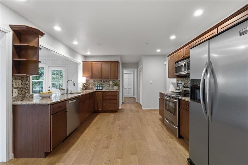 4 bedroom, 3 bathroom, 2,707 sq ft single family residence for sale at 7140 Duncourtney Drive, Sandy Springs, GA 30328 — photo 8