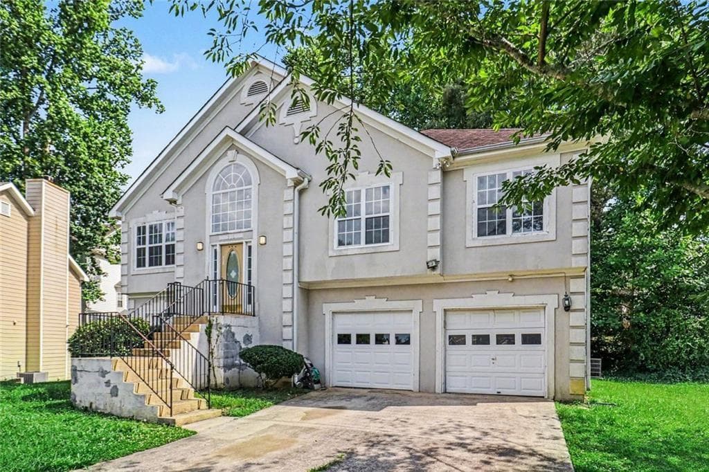 4 bedroom, 3 bathroom, 2,334 sq ft single family residence for sale at 715 Sylvia Court, Riverdale, GA 30296 — photo 2