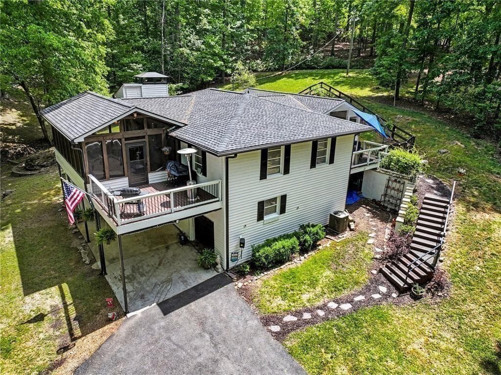 4 bedroom, 2 bathroom, 2,456 sq ft single family residence for sale at 7250 Timber Trail, Cumming, GA 30041 — photo 2