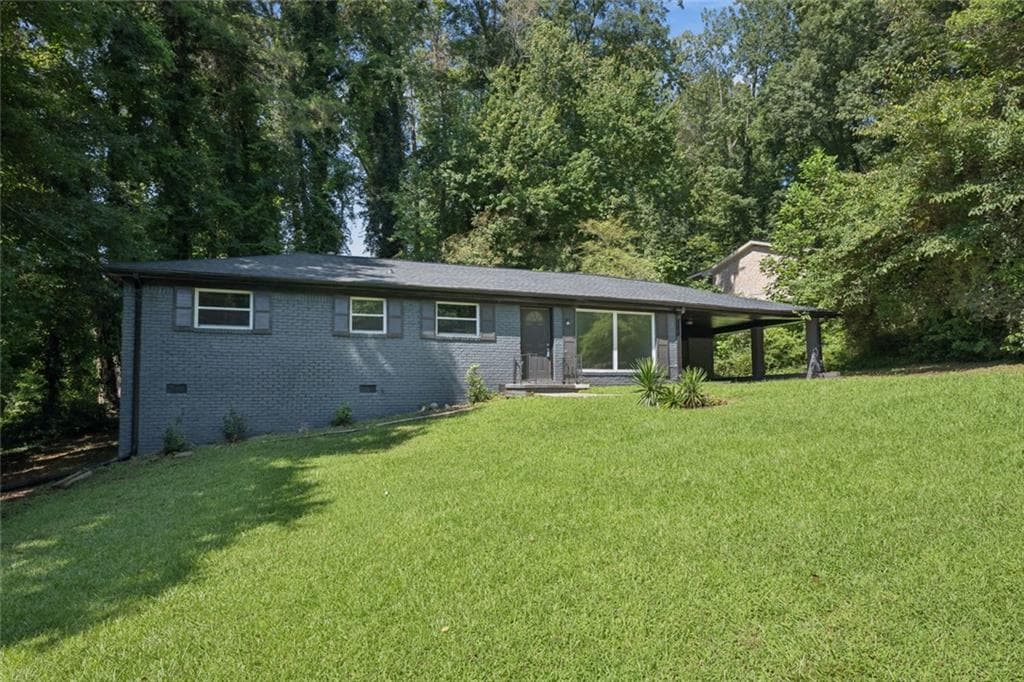 3 bedroom, 2 bathroom, 1,200 sq ft single family residence for sale at 5726 Southwick Court, Atlanta, GA 30349 — photo 2