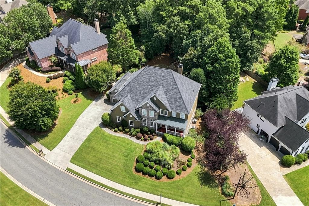5 bedroom, 6 bathroom, 5,813 sq ft single family residence for sale at 3014 Woodbridge Lane, Canton, GA 30114 — photo 2