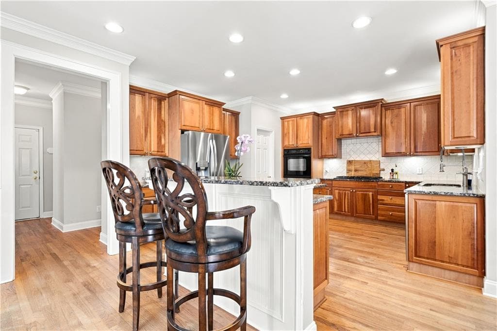 5 bedroom, 6 bathroom, 5,813 sq ft single family residence for sale at 3014 Woodbridge Lane, Canton, GA 30114 — photo 4