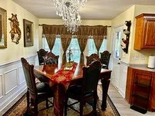 7 bedroom, 4 bathroom, 4,578 sq ft single family residence for sale at 7643 Highway 145, Carnesville, GA 30521 — photo 7