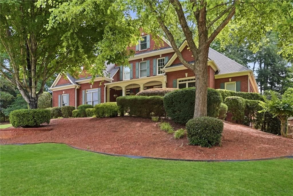 6 bedroom, 5 bathroom, 4,803 sq ft single family residence for sale at 5325 Mcintosh Drive, Cumming, GA 30040 — photo 2