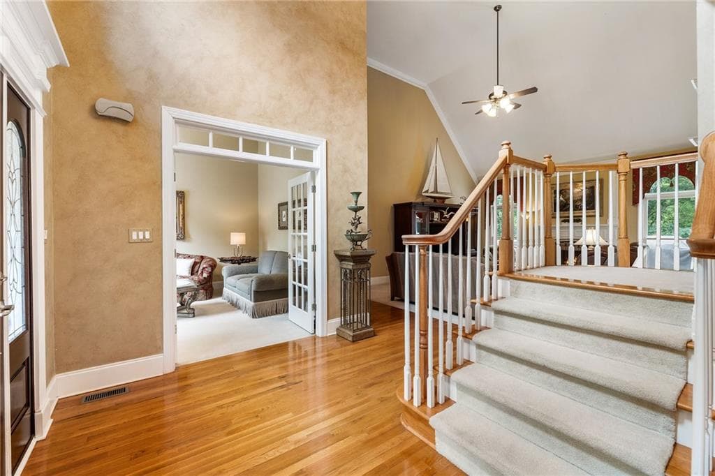 4 bedroom, 6 bathroom, 5,838 sq ft single family residence for sale at 4110 Runnymede Drive, Lilburn, GA 30047 — photo 4