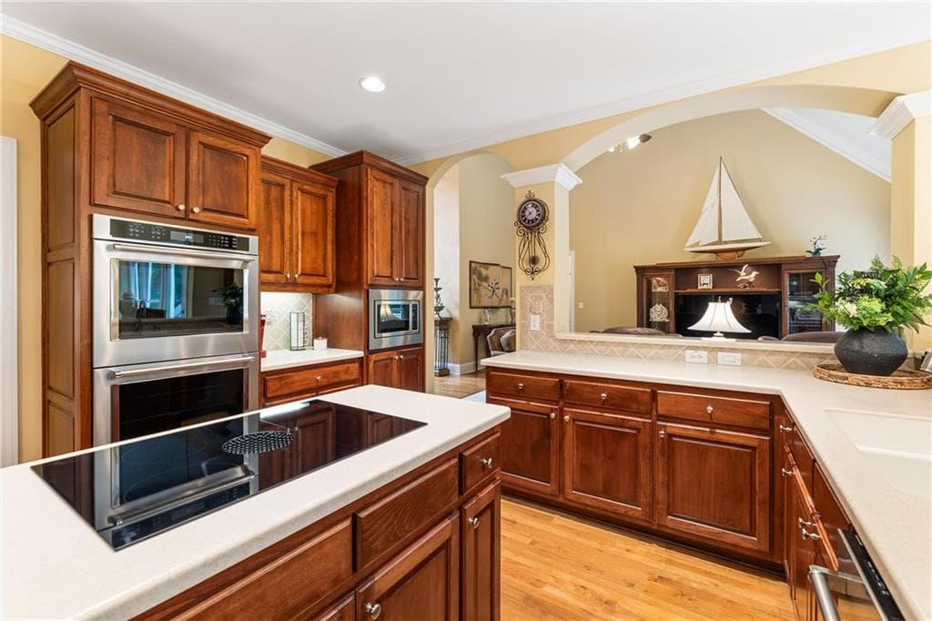 4 bedroom, 6 bathroom, 5,838 sq ft single family residence for sale at 4110 Runnymede Drive, Lilburn, GA 30047 — photo 7