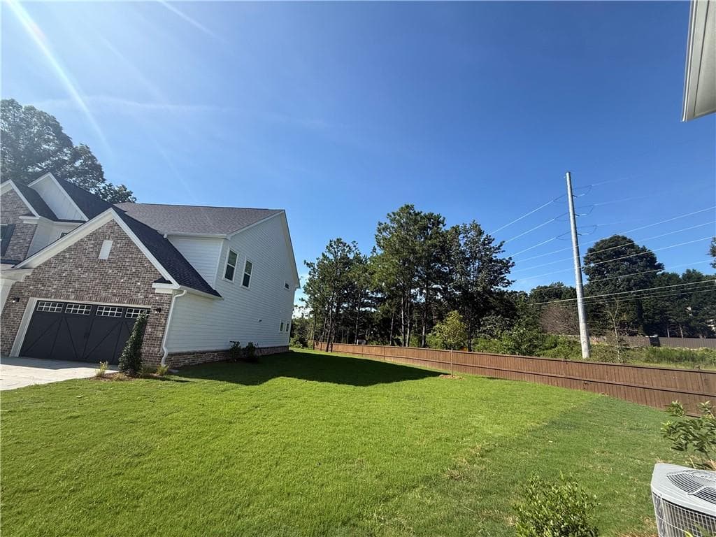 5 bedroom, 4 bathroom, 3,160 sq ft single family residence for sale at 4835 Rosarian Drive, Cumming, GA 30040 — photo 6