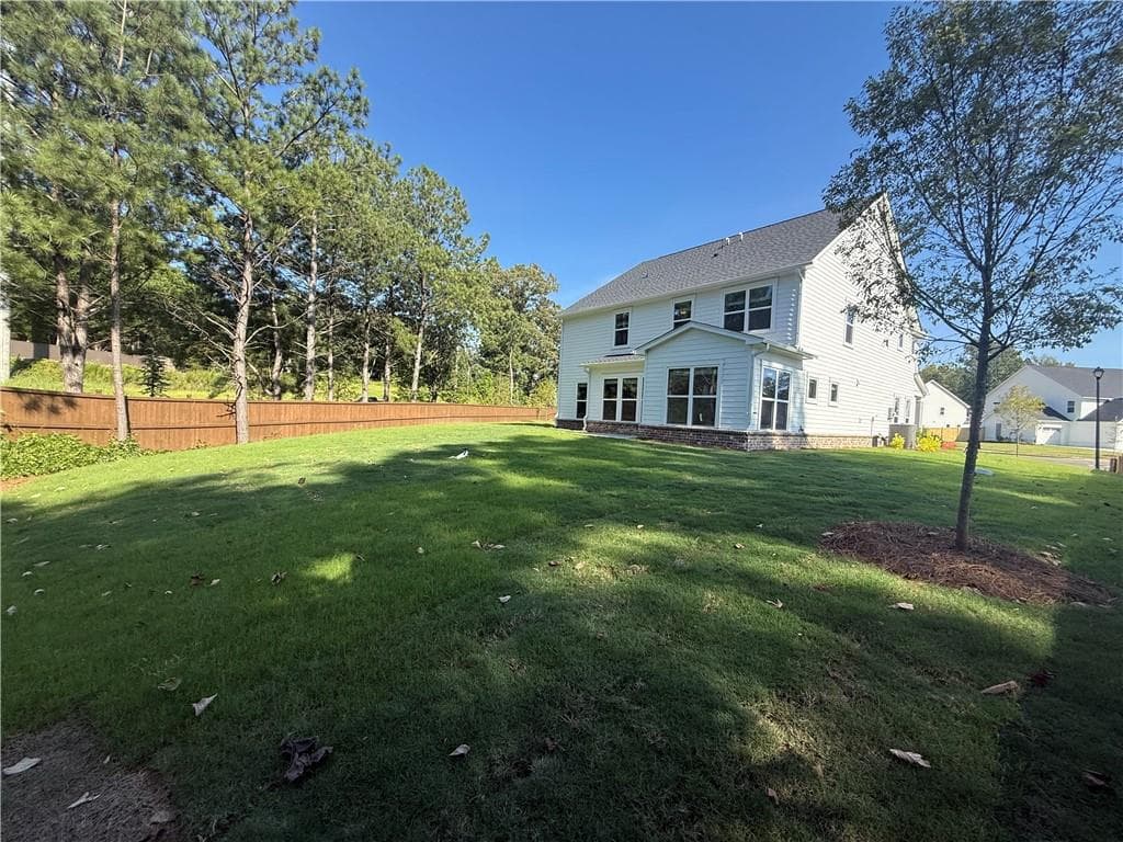 5 bedroom, 4 bathroom, 3,160 sq ft single family residence for sale at 4835 Rosarian Drive, Cumming, GA 30040 — photo 4