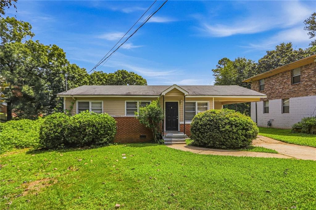 2 bedroom, 1 bathroom, 825 sq ft single family residence for sale at 297 Reed Street, Scottdale, GA 30079 — photo 1 of 23