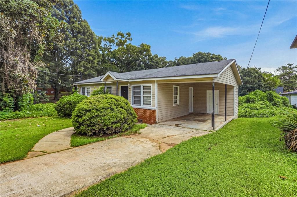 2 bedroom, 1 bathroom, 825 sq ft single family residence for sale at 297 Reed Street, Scottdale, GA 30079 — photo 2