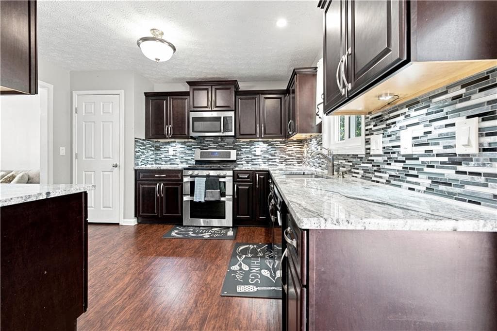 4 bedroom, 4 bathroom, 2,082 sq ft single family residence for sale at 1603 Eagle Drive, Woodstock, GA 30189 — photo 7