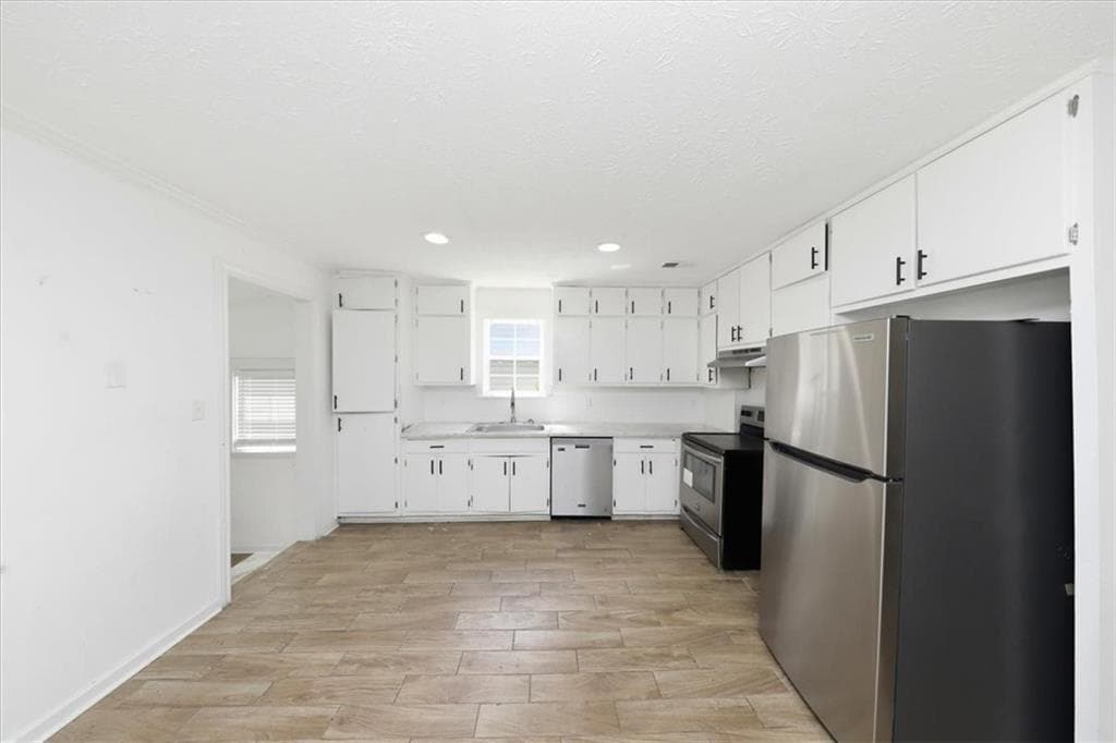 4 bedroom, 3 bathroom, 1,631 sq ft single family residence for sale at 6326 Steepleridge Court, Riverdale, GA 30296 — photo 5