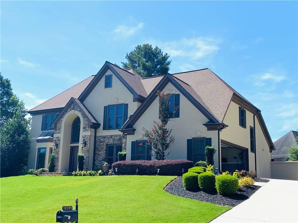 5 bedroom, 4 bathroom, 4,971 sq ft single family residence for sale at 10295 Groomsbridge Road, Johns Creek, GA 30022 — photo 2